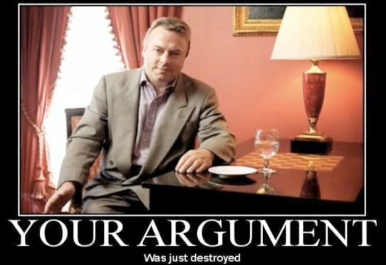 A picture of a smiling Christopher Hitchens, posed at a side table in a chair with a cigarette. The meme's caption reads "Your argument was just destroyed."
